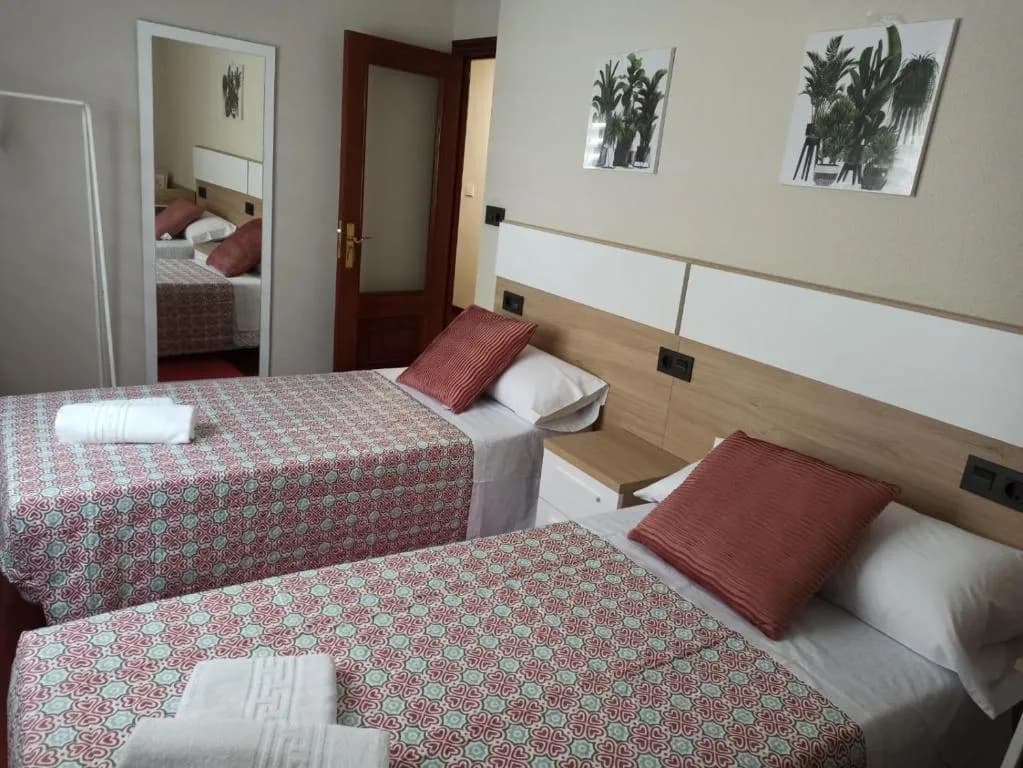 Apartamento — Habitación con camas individuales