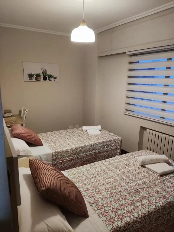 Apartamento — Habitación con camas individuales
